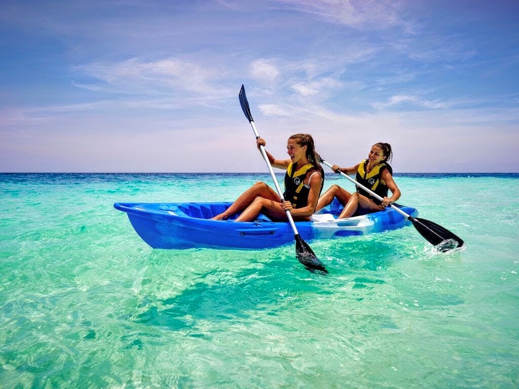 Learn catamaran skills or just ride for fun; kayaking in the lagoon is easy, Outrigger Konotta Maldives Resort