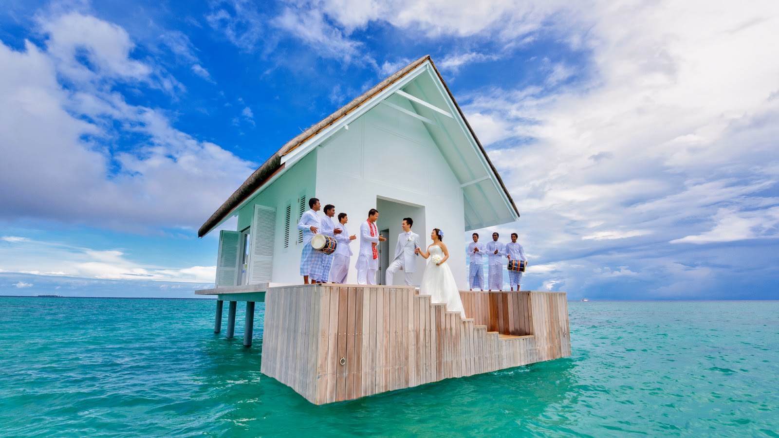 An Overwater Wedding Pavilion afloat in the UNESCO Biosphere Preserve, Four Seasons Resort Maldives at Landaa Giraavaru